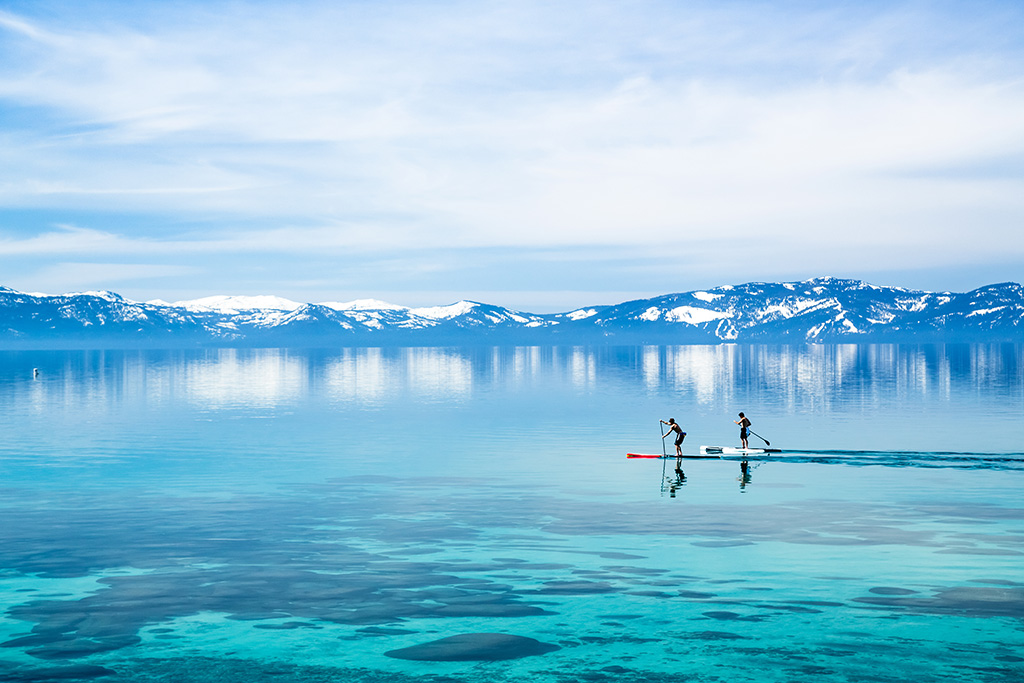 Two people paddleboarding
